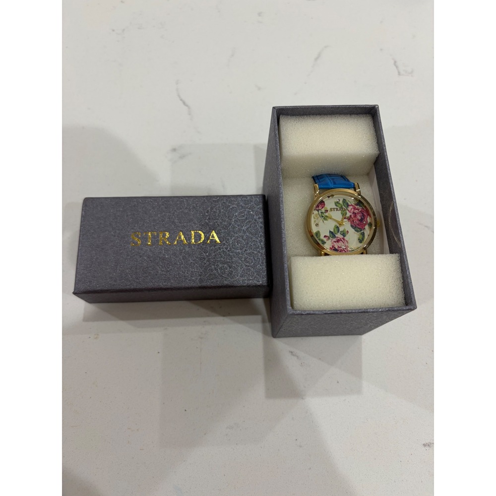 Strada Womens Floral Dial Gold Tone Watch Blue Croc Embossed Strap with Box
